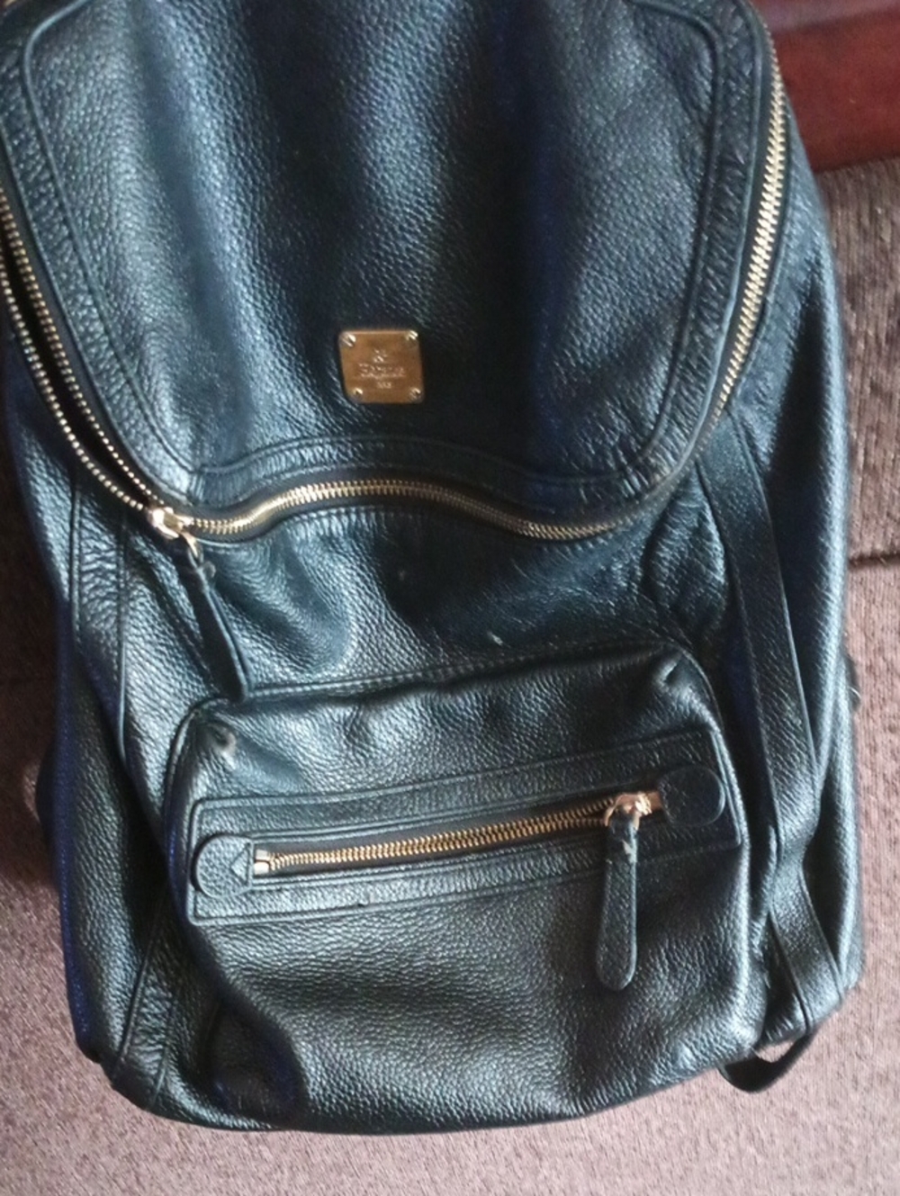 Black Leather Men's Backpack with Gold Hardware